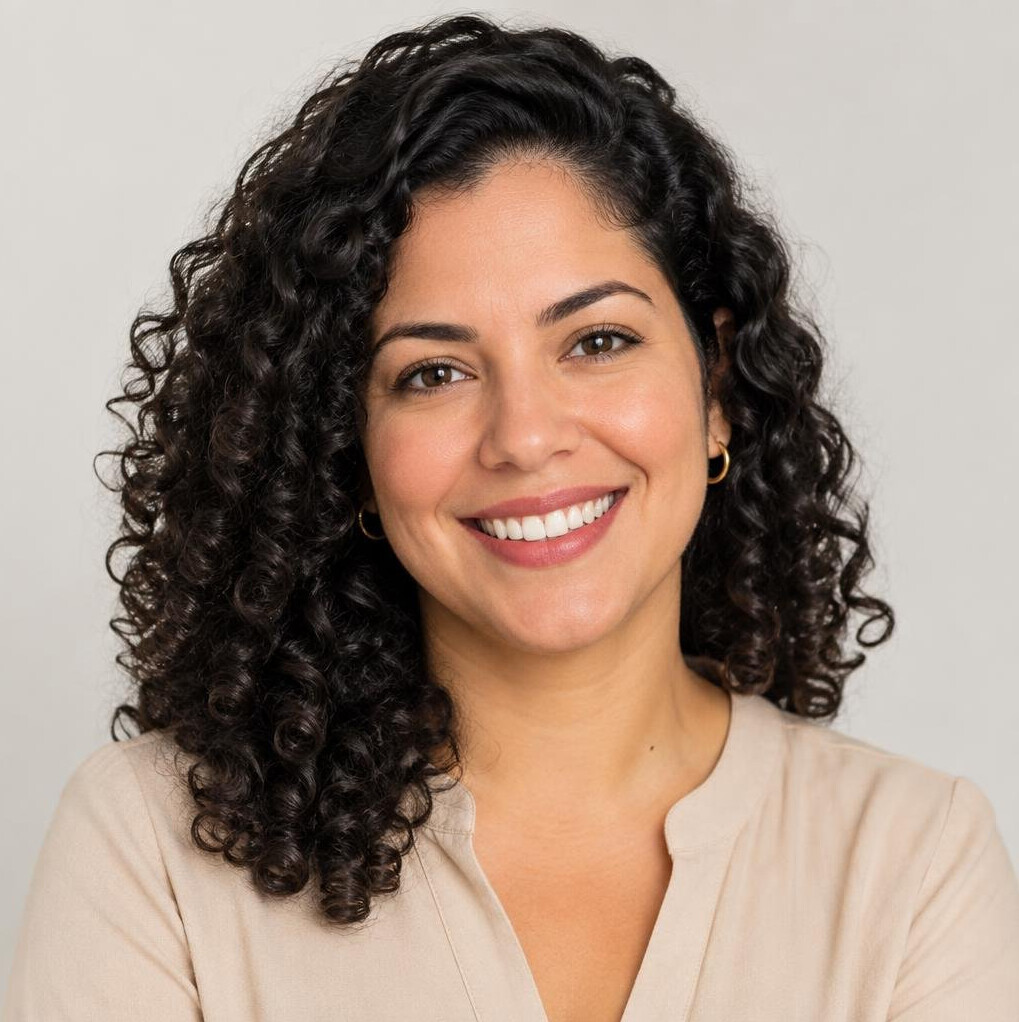 Studio portrait of a Brazilian woman smiling